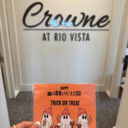 a personholding an orange card