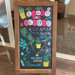 chalkboard with colorful announcement of event